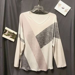 Lg size blouse with geometric patterns in pink, gray, & white.